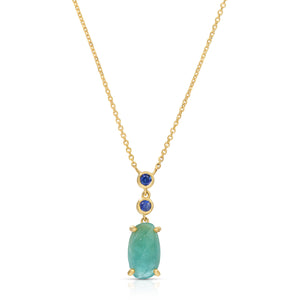 A 14k yellow gold drop pendant necklace on a white background, featuring a natural rose-cut grandidierite stone crowned by two stacked blue sapphires on a fine gold chain.
